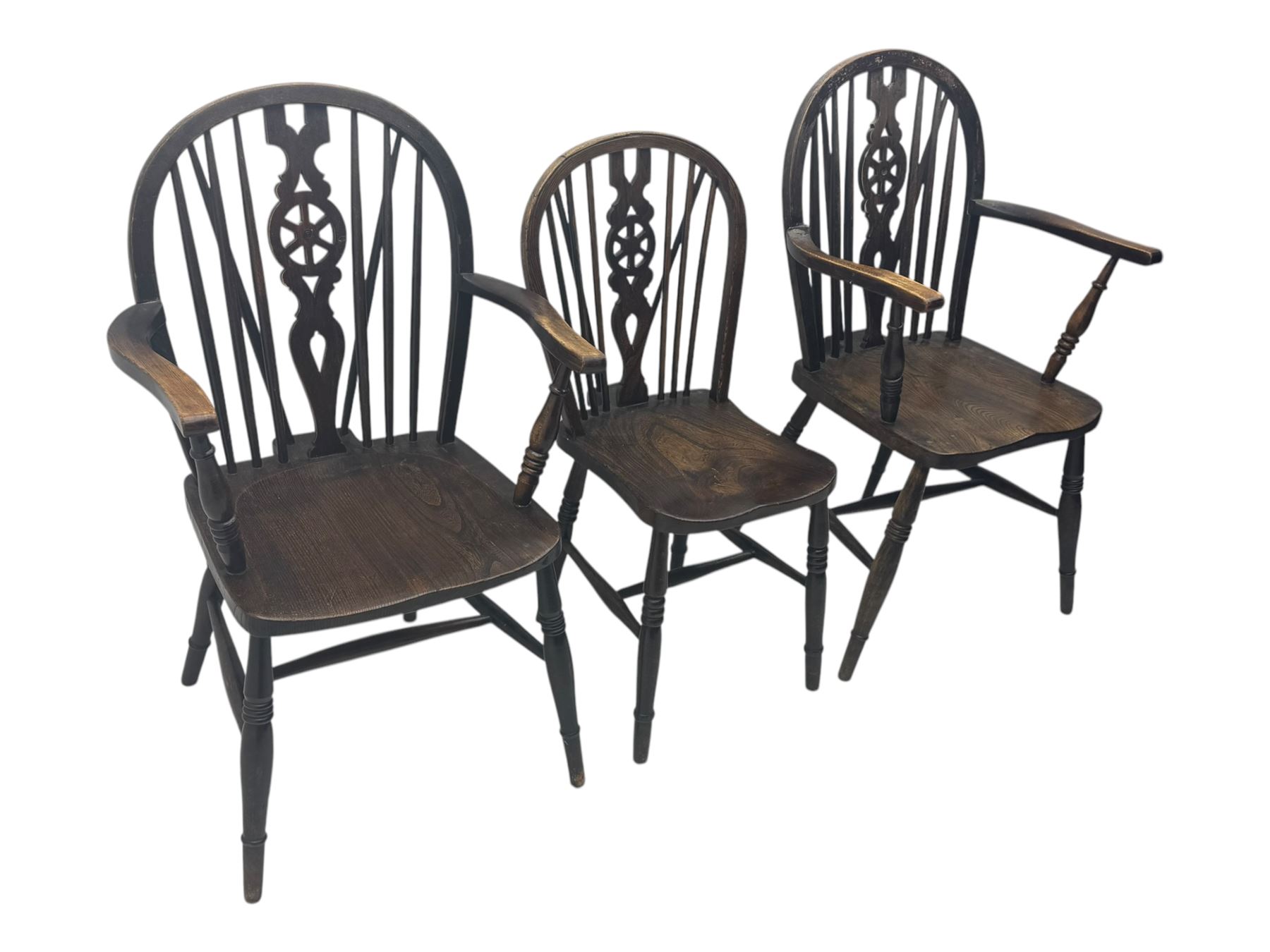 Set of six 19th century elm and ash dining chairs, hoop back with pierced wheel-shaped central splat, shaped saddle seat, raised on turned supports united by H-stretchers