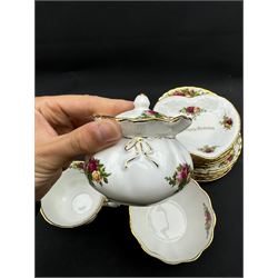 Royal Albert Old Country Roses tea service for six, comprising teapot, milk jug, open sucrier, cups and saucers, dessert plates, two trinket dishes covered jar and clock