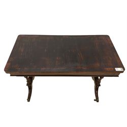 Regency rosewood card table, fold-over swivel action rectangular top with crossbanding, single frieze drawer, raised on turned end supports terminating in splayed feet with castors, joined by ring turned stretcher