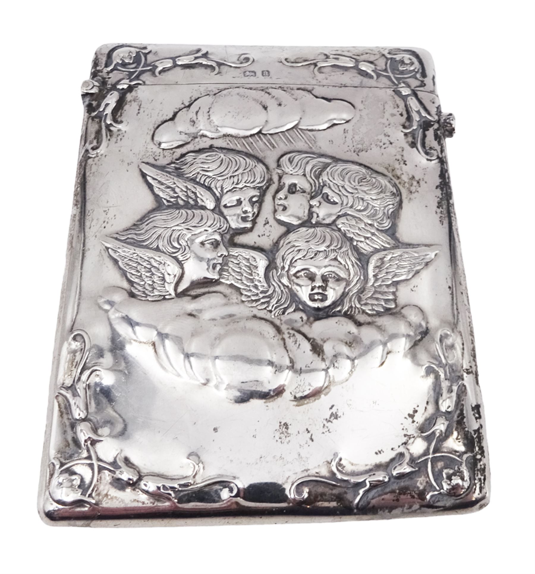 Late Victorian silver card case, of rectangular form with rounded corners, embossed with four putti amongst clouds, engraved with initials verso, hallmarked Henry Matthews, Birmingham 1900, H10.5cm