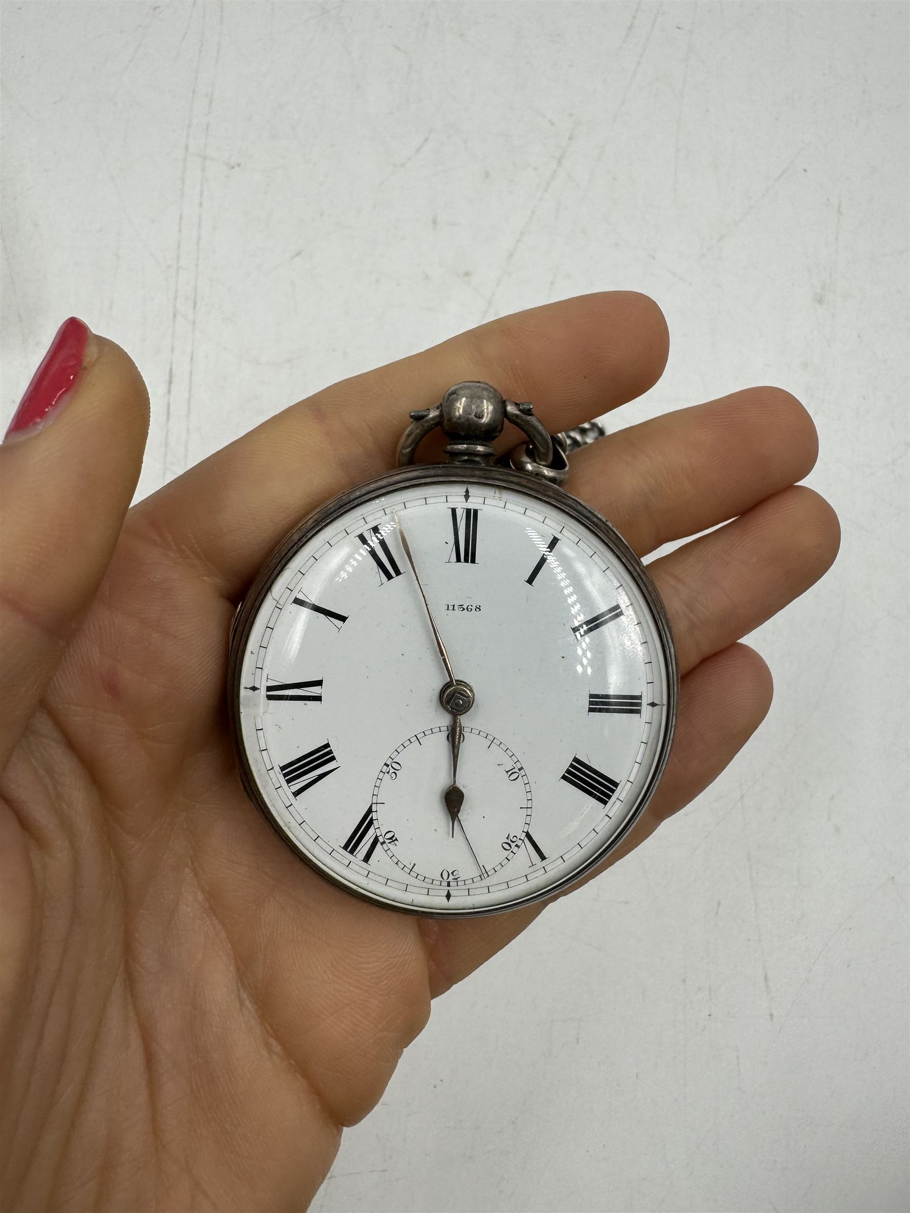 Victorian silver open faced lever pocket watch, the white dial with black Roman numerals and a subsidiary seconds dial, numbered 11368, case hallmarked Joseph Hirst, London 1925, with hallmarked silver watch chain