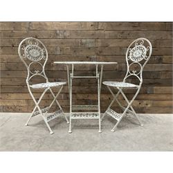 Ivory painted wrought metal oval bistro folding garden table, and two chairs