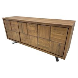 Samba 'Camden' oak sideboard, rectangular top over three block panelled cupboard doors, raised on angled black metal supports connected with stretcher