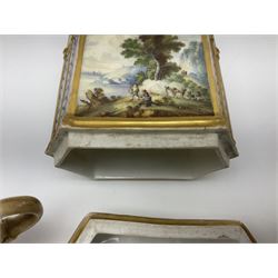 Two 19th century continental teapots and warmers, each teapot upon a hexagonal warming base, the first example painted with landscape scenes, the second with nesting birds in gilt branches, H28cm