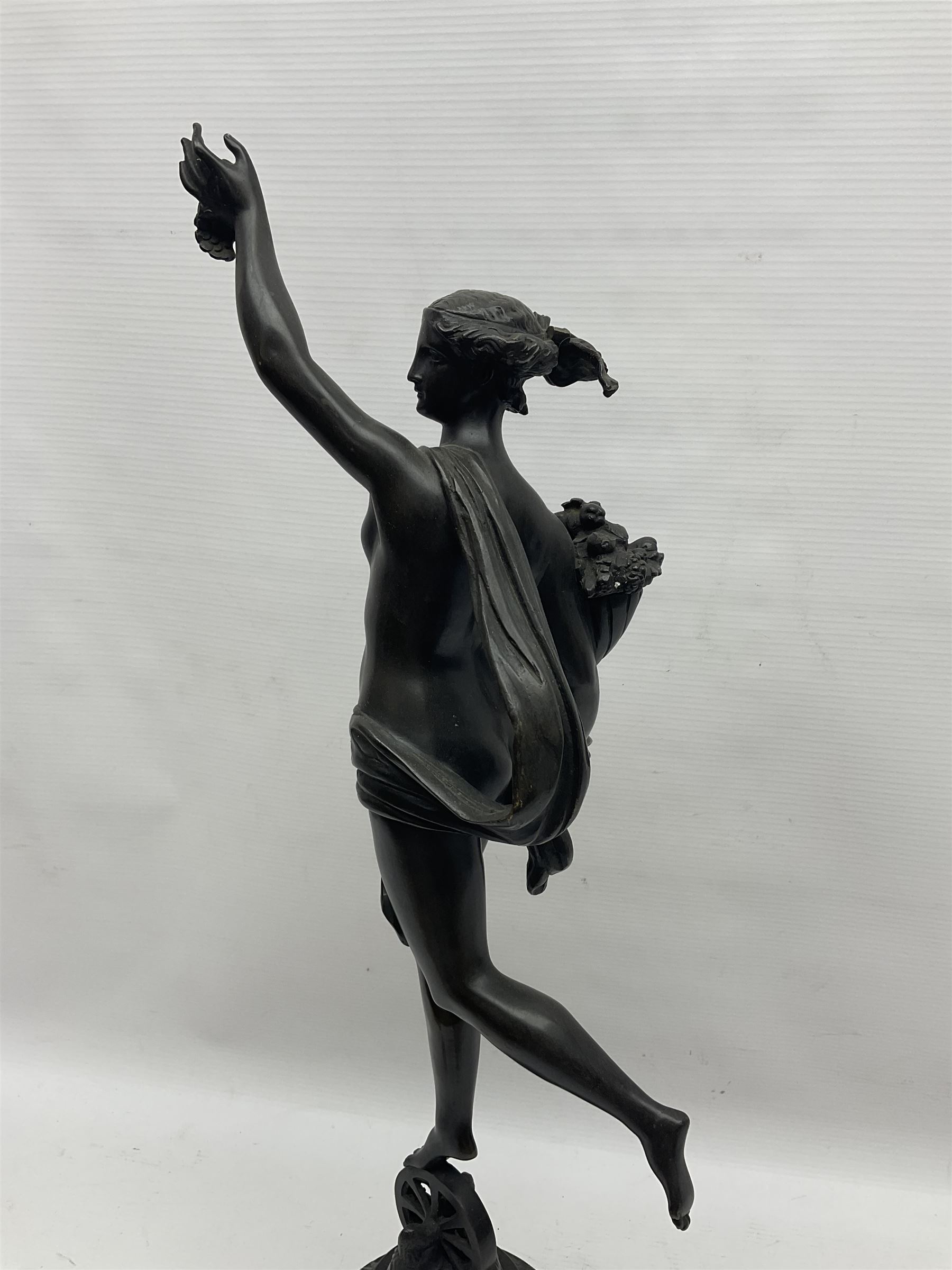 After Louis Guillaume Fulconis, a bronzed figure of Fortuna with cornucopia in her right hand and standing on a wheel on green serpentine base, height 60cm