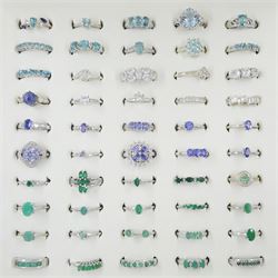 Fifty silver stone set rings including tanzanite, apatite, zircon and topaz