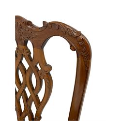 Set of twelve Chippendale design mahogany dining chairs, shaped cresting rail carved with foliage and C-scrolls, pierced interlaced splat with curled leaf decoration, upholstered drop-in seat, moulded seat rails, on scrolled acanthus carved cabriole supports with ball and claw feet 