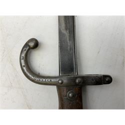 British No.4 Mk.II spike bayonet, unmarked, with 20cm round steel blade; in steel scabbard L26cm overall; Russian Mosin-Nagant rifle socket bayonet with 43cm cruciform blade, lacking scabbard; and French St. Etienne Gras bayonet dated 1876, No.G49169/178, lacking scabbard (3)