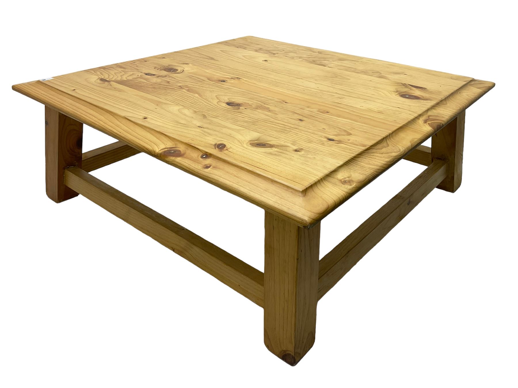 Pitch pine coffee table, moulded top square top raised on splayed supports united by box stretchers 