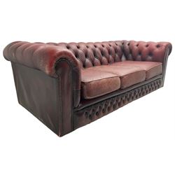 Chesterfield three-seat sofa upholstered in red buttoned leather