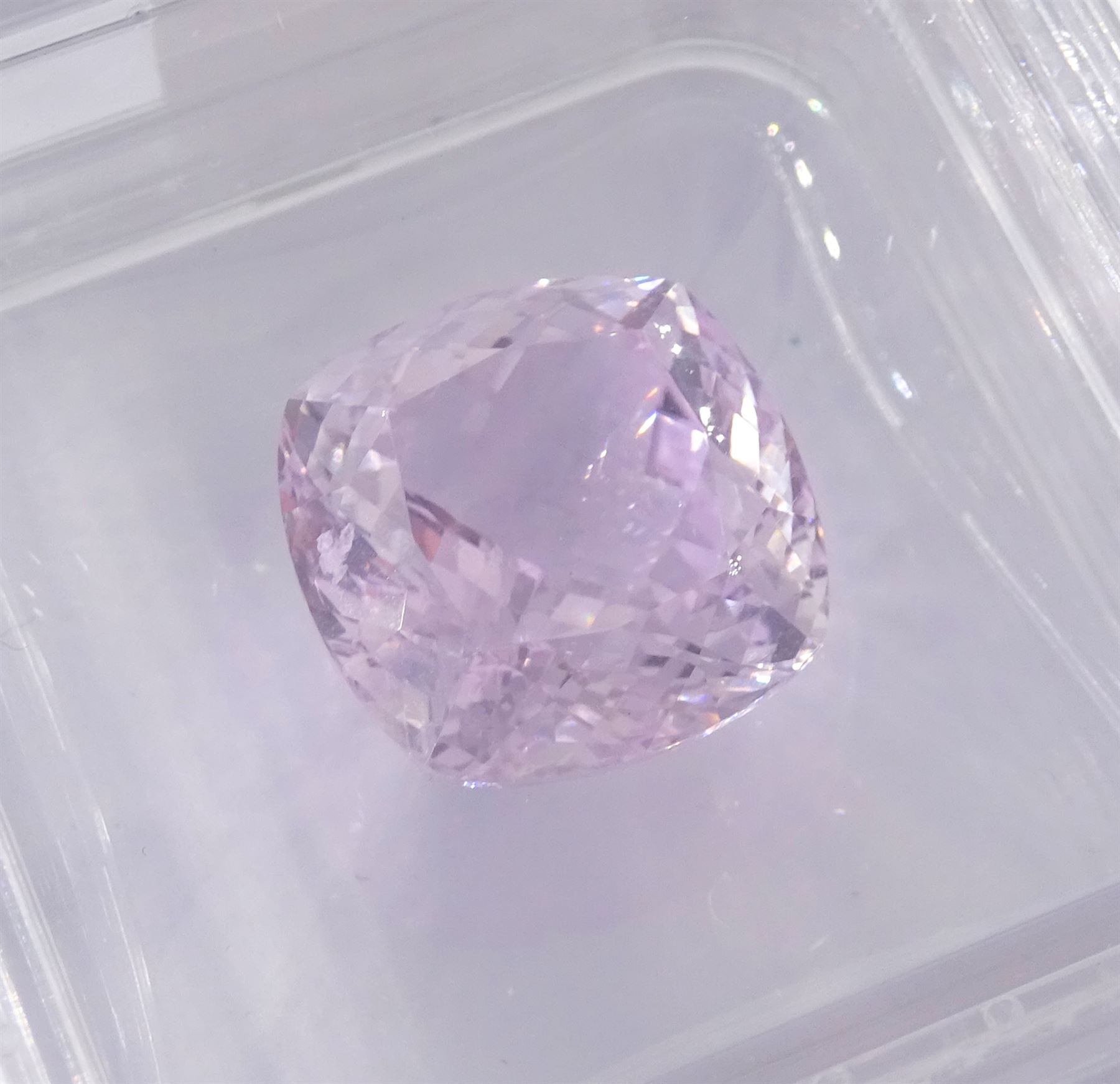 Two loose kunzite stones including 26.70 carat oval cut and a 13.40 carat cushion cut