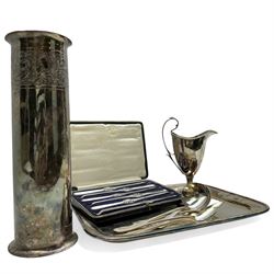 Group of silver plate, comprising vase of cylindrical form, H30.5cm, cream jug of helmet form, including handle H18.5cm, tray of oblong form, L35.5cm, and cased set of six lobster picks