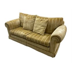 Duresta England - two-seat sofa, upholstered in pale gold fabric, traditional shape with rolled arms