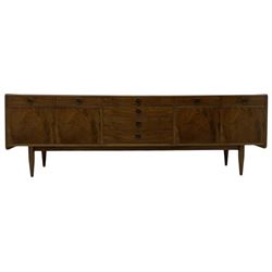 Mid-20th century figured walnut sideboard, fitted with seven drawers and two double cupboa...