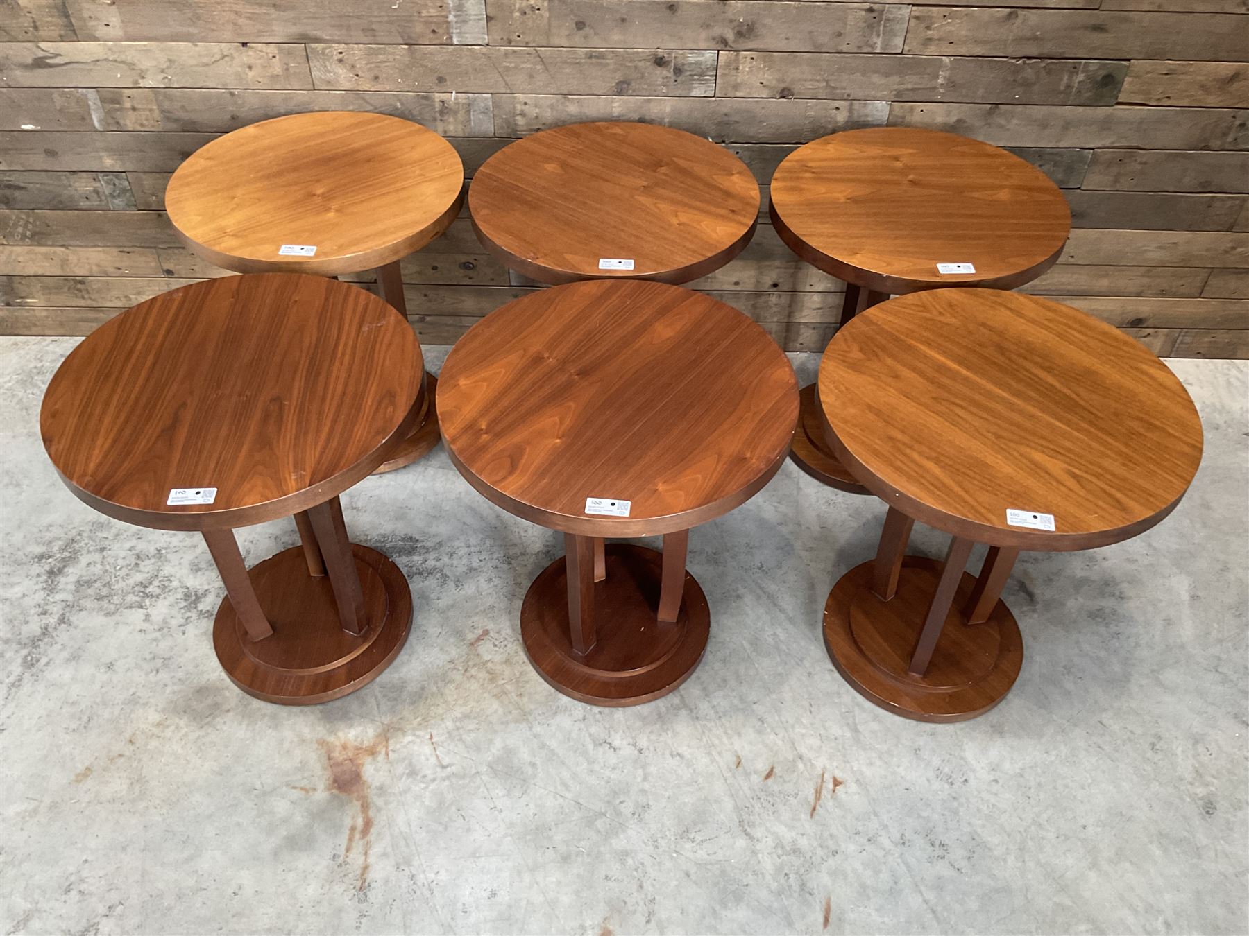 Six walnut circular bar or bedroom occasional tables