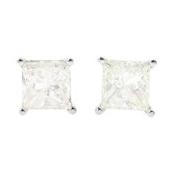 Pair of 14ct white gold princess cut diamond, screw back stud earrings, stamped 14K, total diamond weight approx 1.00 carat