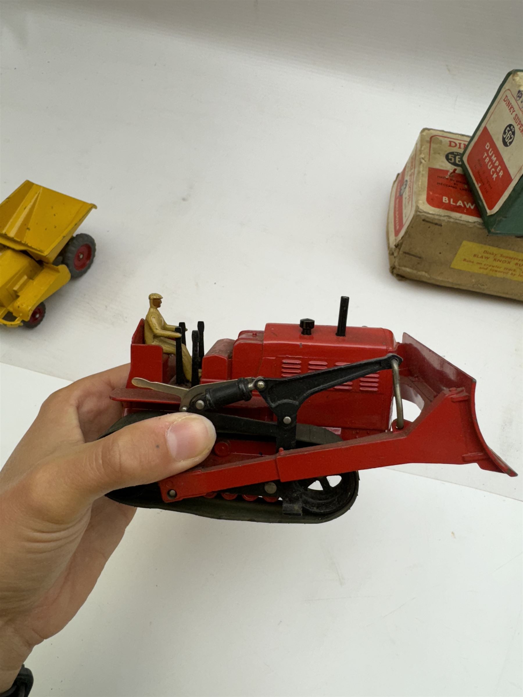 Two Dinky Supertoys models, comprising Blaw Knox Bulldozer no. 561 and Dumper Truck no. 562, both boxed 