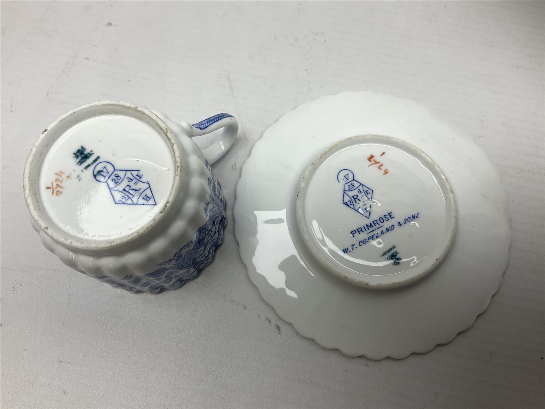 Late Victorian W T Copeland & Sons Primrose pattern coffee set for six, pattern no 2724, comprising coffee pot, milk jug, sugar bowl and six coffee cans and saucers, all upon a Lazy Susan, of circular form, with gilded rim and upon domed pedestal foot, with printed mark beneath, D44.5cm