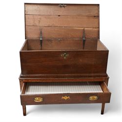 Late 18th century oak blanket box on stand, the box with hinged lid enclosing vacant interior, the stand fitted with single drawer, on square tapering supports 