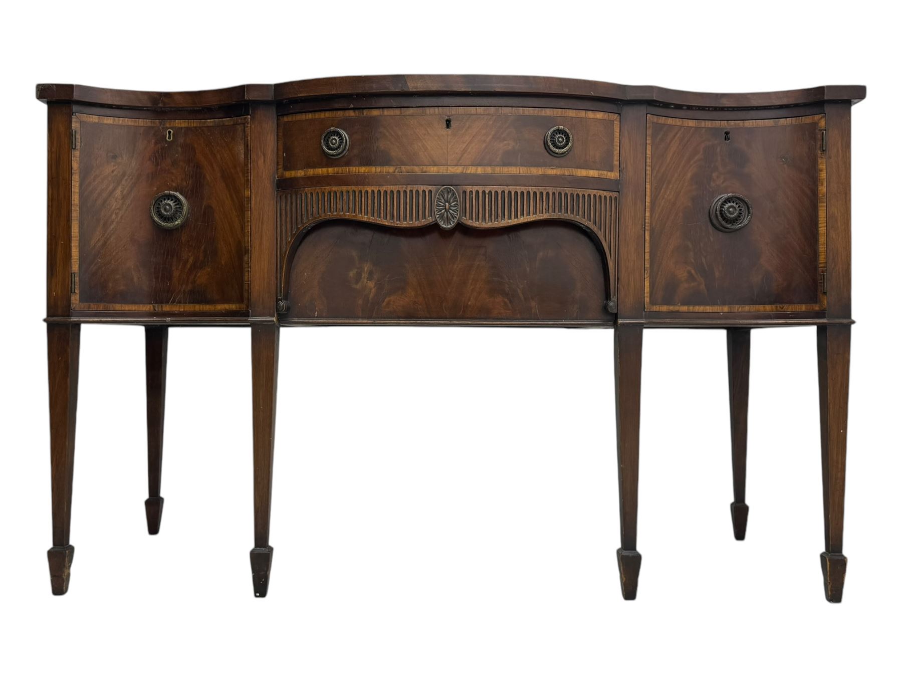 Early 19th century serpentine sideboard, fitted with two cupboards and two drawers, on square tapering supports with spade feet