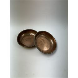 Pair of Arts & Crafts copper dishes by Gordon Russell, with lightly hammered finish and oblique gadrooned rim, impressed beneath 'Golf Hotel Grange Over Sands' and with maker's mark for Lygon