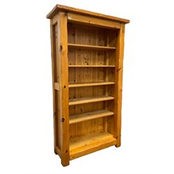 Pine open bookcase, fitted with five shelves