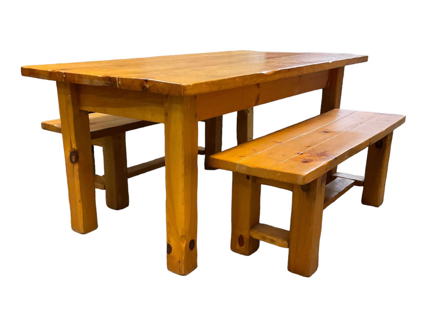 Pine dining table, rectangular plank top on square supports (181cm x 91cm, H80cm); together with two benches (133cmx 41cm, H47cm)