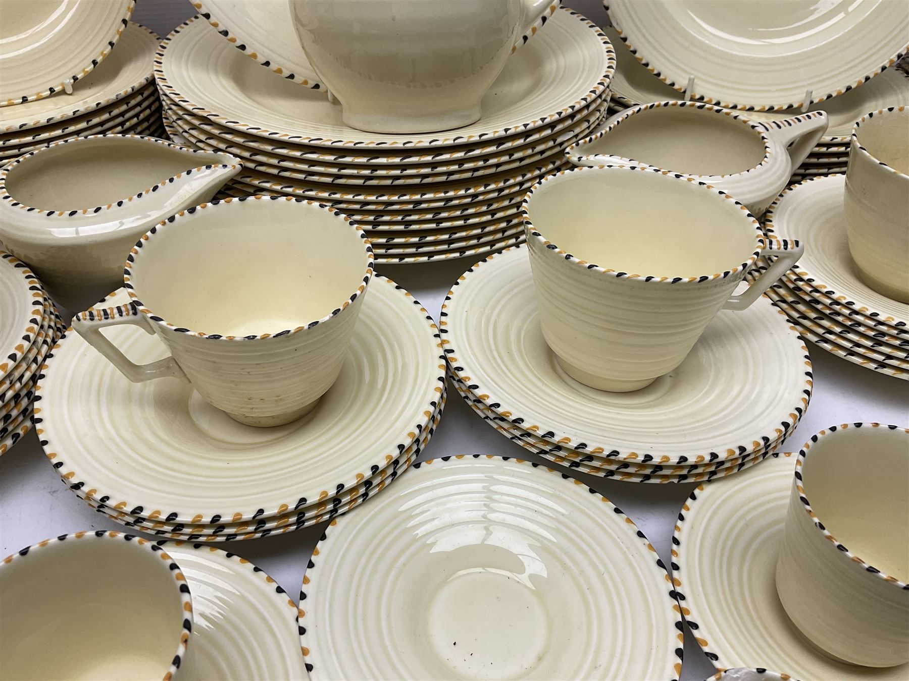 Art Deco Crown Ducal tea and dinner wares, reg no. 784158, comprising dinner plates, teacups, saucers, coffee cups, crescent shaped side plates, bowls, eggcups, etc, (93)