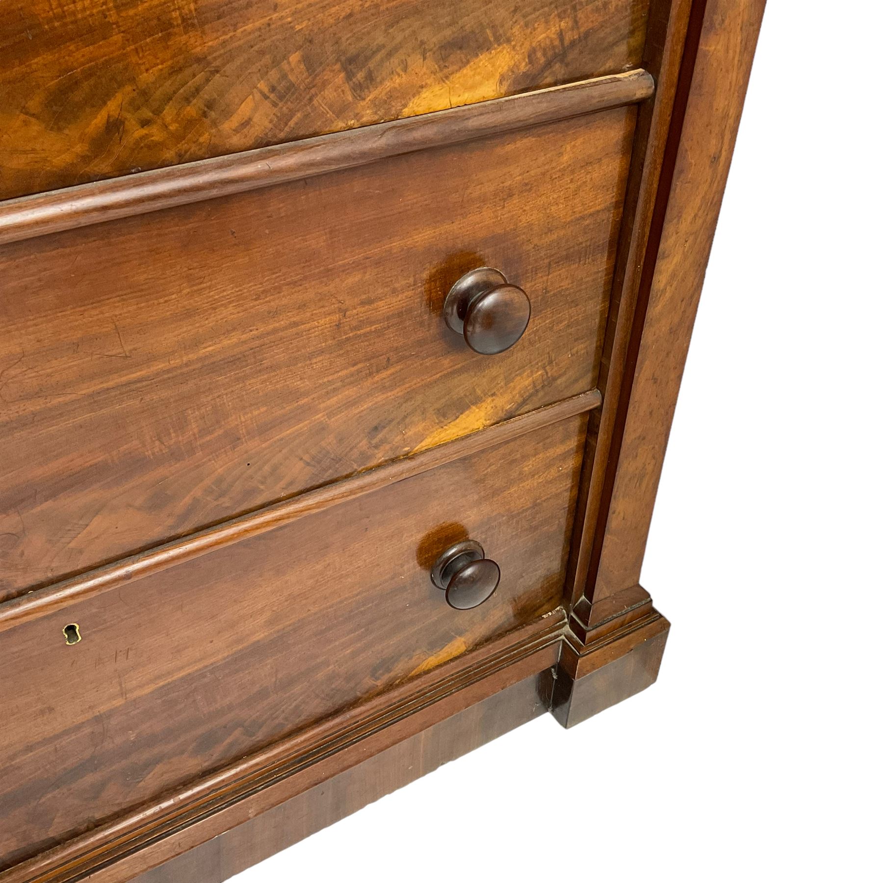 Victorian mahogany straight fronted chest, fitted with four drawers enclosing by square upright pilasters, on stepped chamfered plinth base