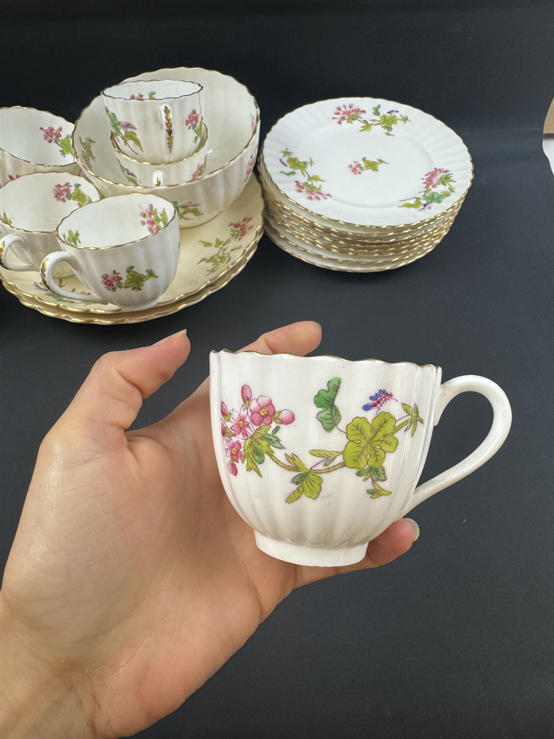 Coalport part tea service, decorated with floral sprigs, including eight cups and saucers, milk jug, eight dessert plates etc  