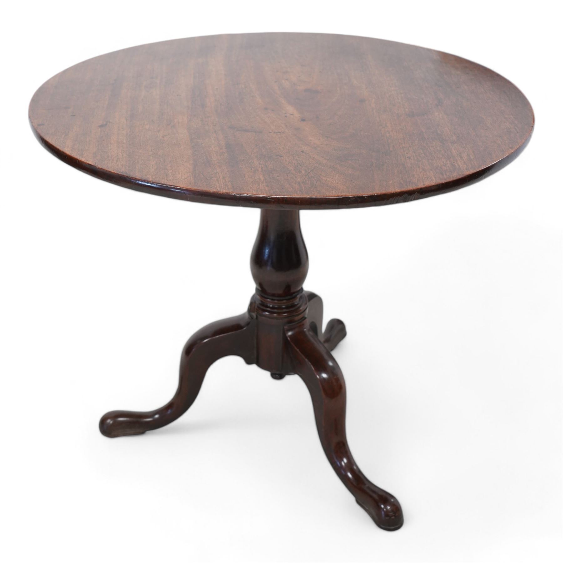 Large George III mahogany tripod table, circular single-piece tilt-top on turned baluster pedestal, three out splayed supports 