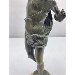 After Ernest Rancoulet, bronzed figure modelled as a man playing the tambourine, upon a stepped circular base, H37cm 