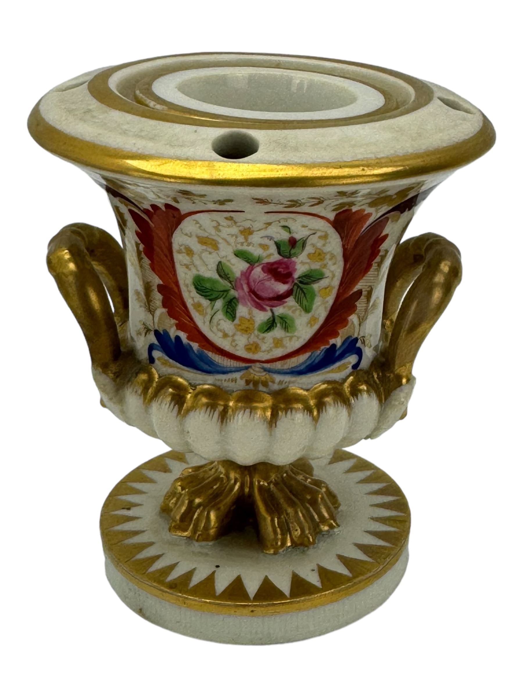 Early 19th century Derby porcelain to include a campana form inkwell, small bottle form vase, twin handled vase and flared rim vase, hand painted with a landscape scene, H10cm (4)