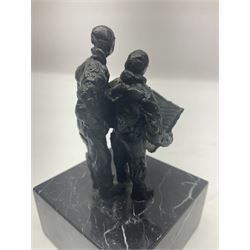 20th century bronze sculpture, modelled as two figures reading, upon a black and white marble base, H14cm