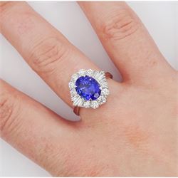 18ct white gold oval cut tanzanite, baguette and round brilliant cut diamond cluster ring, tanzanite 3.00 carat, total diamond weight 0.82 carat, with World Gemological Institute report