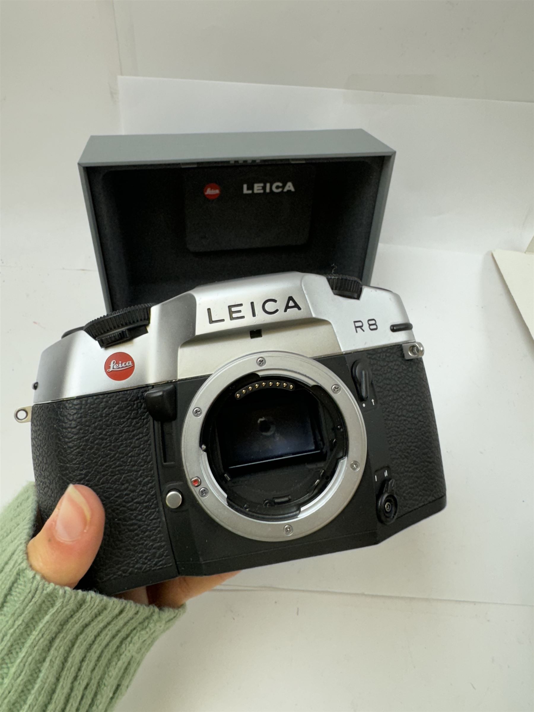 Leica R8 SLR camera body, in chrome and black finish, serial no. 2292640, made in Germany 1996, contained within maker's box with instructions and shoulder strap