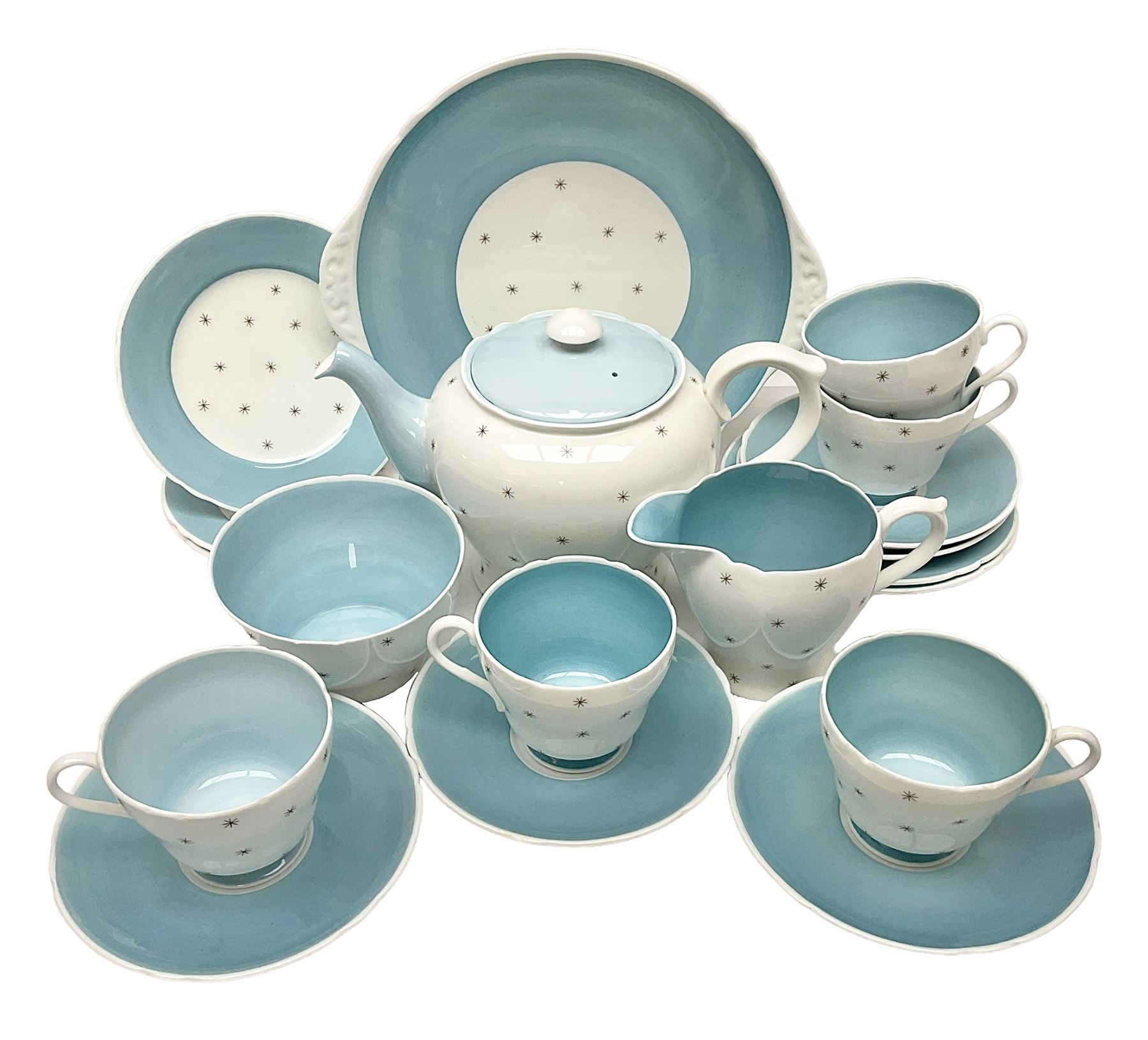 Shelly Pole Star pattern tea service for five comprising teapot, milk jug, open sucrier, cups and saucers, dessert plates and one cake plate 