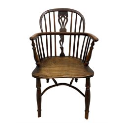 19th century yew wood and elm Windsor chair, low hoop stick back with pierced splat, dished seat raised on ring turned supports joined by crinoline stretcher