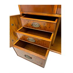 Wade - yew wood hi-fi cabinet, moulded rectangular hinged top over double-door cupboard with figured veneer, enclosing three adjustable shelves, lower section fitted with two cupboards to resemble four drawers, enclosing three drawers and open storage