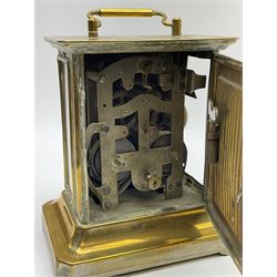 Late 19th century German Junghans “Joker “carriage clock with a musical alarm, engraved rectangular dial plate, circular card dial within an integral glazed bezel, roman numerals, minute track and alarm dial, steel spade hands, glass side panels (one missing) and rear case door, thirty-hour spring driven movement, pin pallet balance escapement, rear wound and set. 
With key.
