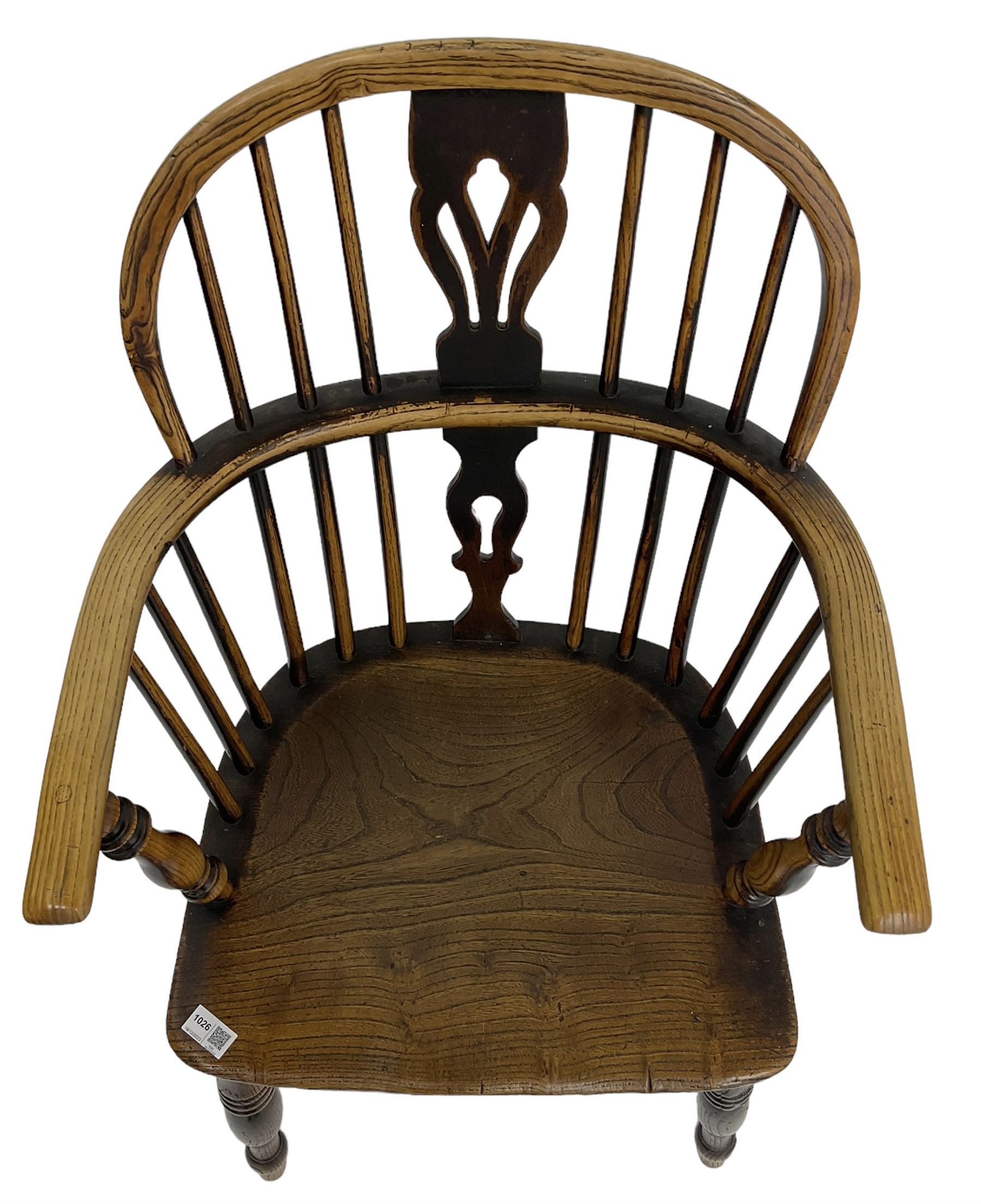 19th century elm and ash Windsor armchair, low double hoop and stick back with shaped and pierced splat, on turned supports united by crinoline stretcher