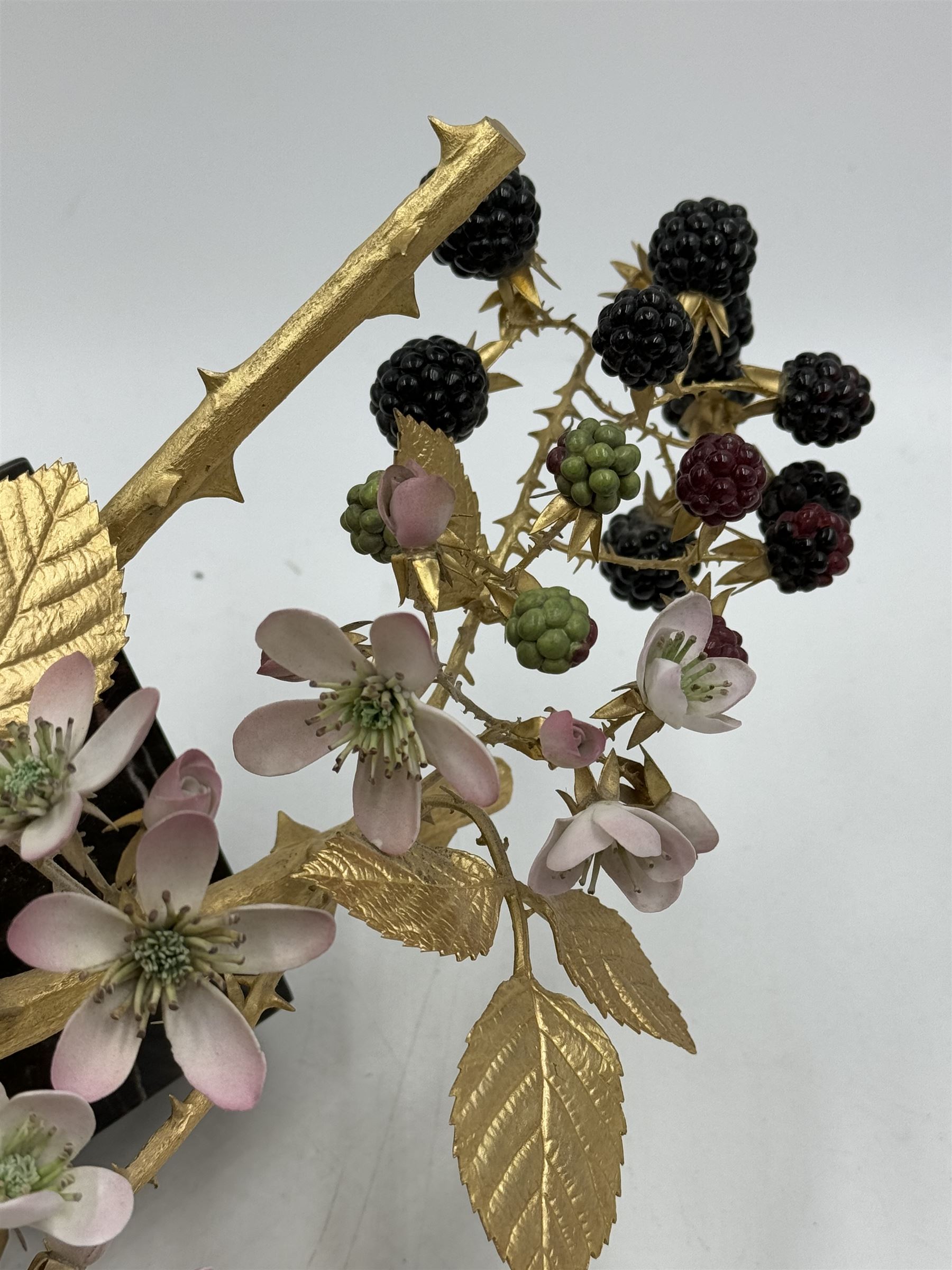 Ruth van Ruyckevelt for St Denis (ex-Royal Worcester) bone china and gilt bronze sculpture of blackberries, upon marble plinth with inset porcelain plaque beneth, code No.A109, overall L39cm