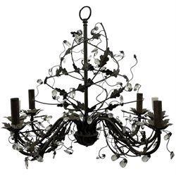 India Jane Interiors - contemporary wrought iron chandelier, adorned with vine and leaf motifs intertwined with faceted glass crystal drops, curved arms supporting six candle-style light fittings, the central stem terminating in a suspension loop