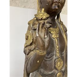 Composite figure of Guanyin standing on rocky ground, with gilt detailing, H104cm
