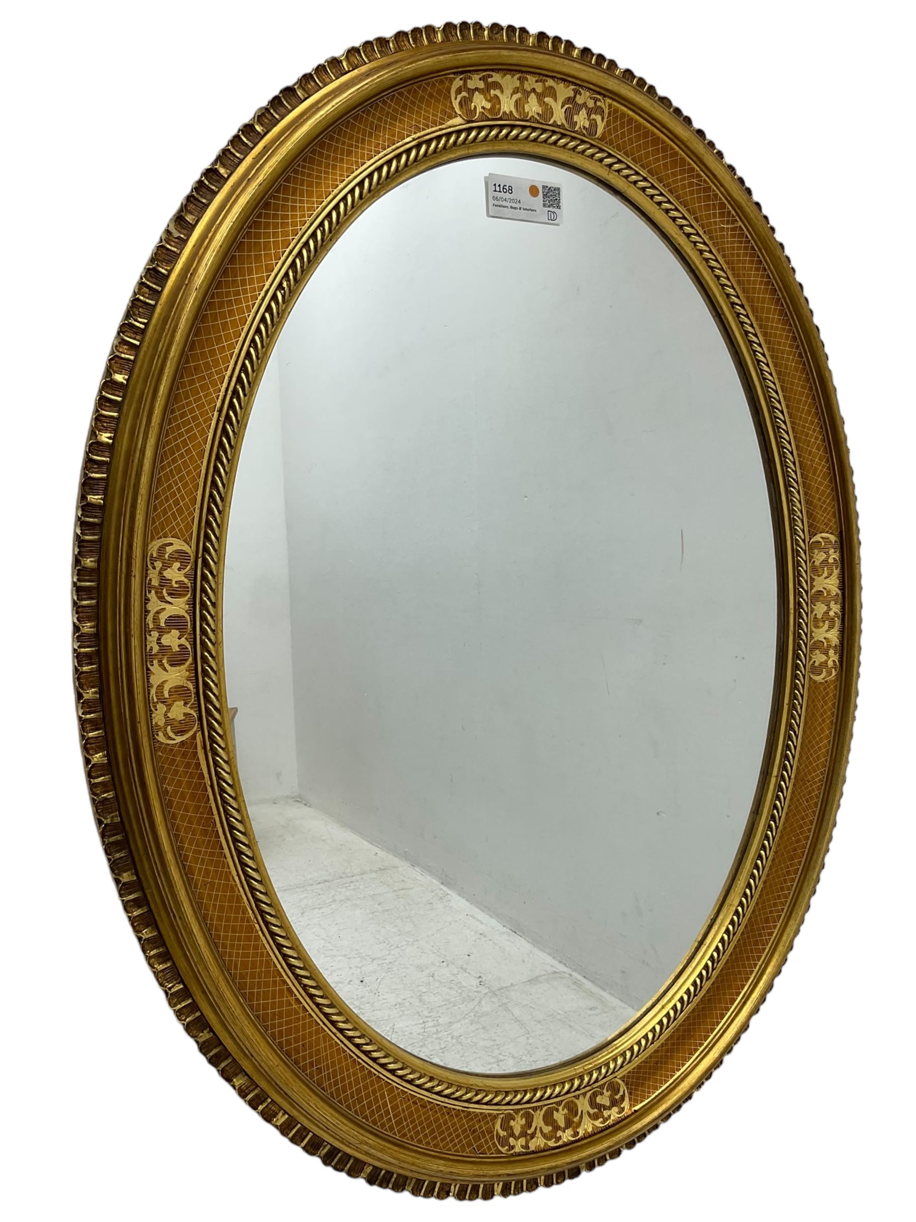 19th century design gilt framed oval wall mirror, shell moulded edge foliate decoration