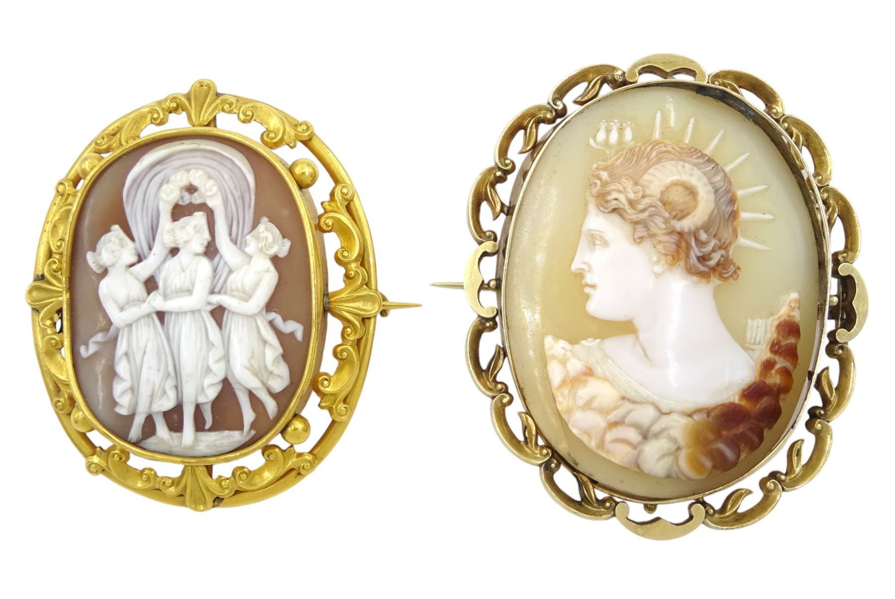 19th century 14ct gold cameo brooch, depicting Alexander the Great wearing the horns of Ammon, in a scroll frame, and a gold-plated cameo brooch depicting the Three Graces