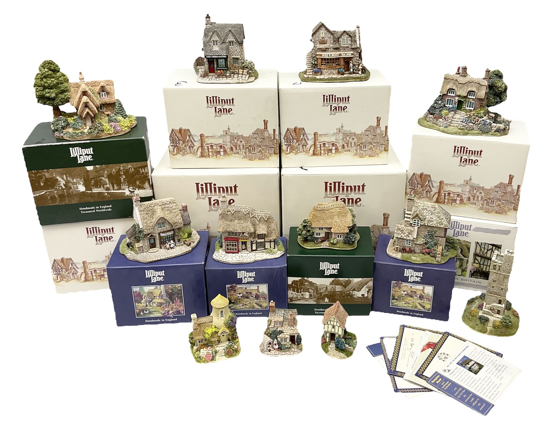 Twelve Lilliput Lane models to include The 1994 Anniversary Cottage Watermeadows, Collector's Club Woodman's Treat, Castle Hill, Huddersfield, Symbol of Membership Kiln Cottage etc, all boxed, eight with deeds