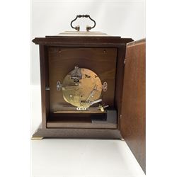 20th oak cased mantle clock, German spring driven movement striking the hours on three gong rods.