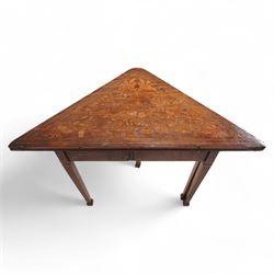 19th century walnut and Dutch marquetry triangular table, the triangular fold-over top reveals a panel of inlaid writing instruments, on square tapering and fluted supports terminating to spade feet 