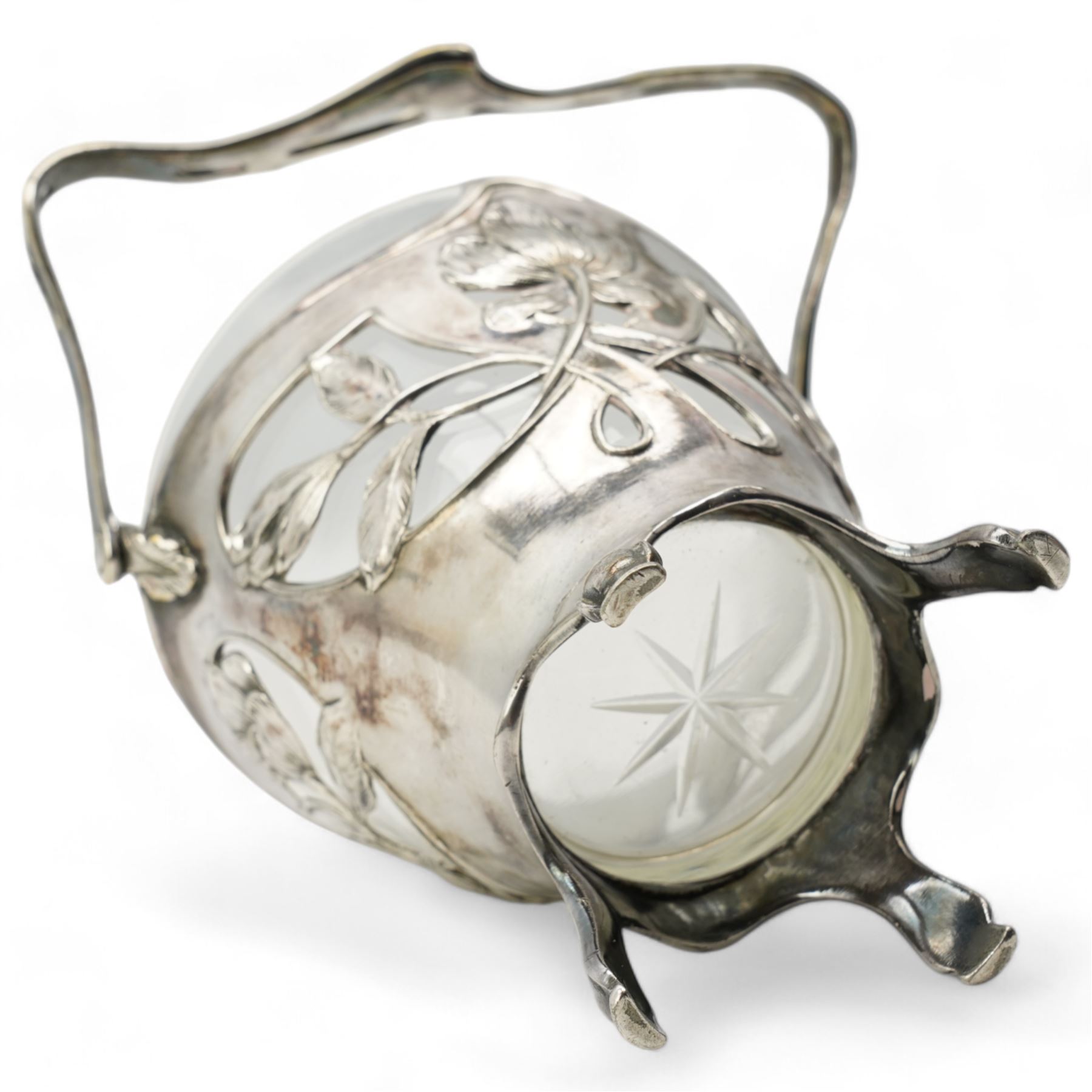 Early 20th century German Art Nouveau silver-plated bonbon basket by Dupper & Bernhold - Esslingen, with pierced and moulded floral body, stylised swing handle and glass liner, stamped DBE, H18cm 